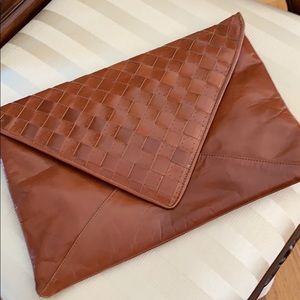 Clutch leather bag